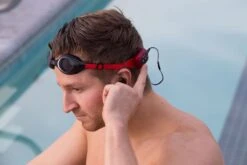 SYRYN MP3 Player With Swimbuds Headphones -Cycling Gear SYRYN SIDE OF HEAD